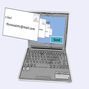 Laptop with e-mail letter emerging from screen.